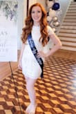 I wore this dress for my bridal shower and loved it! It has no stretch, so definitely need to be careful when sitting as it can get a little short. Otherwise, gorgeous details and got so many compliments! - Jenna F.