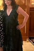 This dress is beautiful! I normally wear a size 8 and the medium fit me perfectly (usually Lulus runs small and I have to get a large). The vee is VERY deep and also very wide - much more so than it looks in the picture. It worked for me because my breasts are small, and wide-set. If you are chesty, this dress would probably be difficult to wear. - Shannon G.