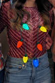 Super cute shirt! Perfect for a holiday party. It was a little tight on me, but still fit. I got a size small and am usually a small. - Jessica B.