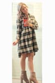 I'm super petite, so I don't normally like oversized items with a lot of material, but I think that's how it's supposed to look... Like a babydoll dress.  The top fit great, and I loved the material... thick and soft like a flannel shirt.  I wore it Christmas day w booties and the sleeves rolled up. - Emily C.