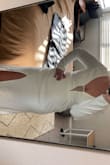 On a Wednesday, my husband and I decided to elope on a Saturday. That Friday I still hadn't picked a dress I deemed worthy of our spontaneous wedding. I paid $10 extra and had it delivered the following morning! I had a breast reduction this year so my breasts didn't quite fill out the chest area as it would've normally. My butt is pretty big otherwise a L would've fit perfectly. It was a little long but the slit was very sexy! I felt it was very flattering on my stomach. The material was thick and felt of great quality for the price! In 40-degree weather, I felt decently warm! Absolutely would recommend. Thank you Lulus for playing a big role in our special day! - Stephanie K.