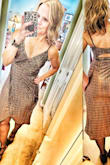 Love this dress. It is cut straight though and would ride up on my hips but the cut is super flattering. You also cannot wear a bra with it so I taped boob pads inside and that worked perfectly. - Julie W.