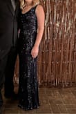 Fit perfect. I have more of an athletic build with thicker bottom and thighs and dress fit great. - Kaylee F.