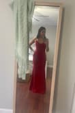 Love this dress! Wearing it to a work conference formal night. Im 57 and the dress touches the floor. With heels on it will be perfect. Its very fitted and hugs every curve. The material is great thick quality. You dont need to wear a bra if you dont want to. Looks very classy & elegant. - Patrisha O.