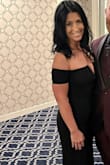 I wore this dress to a New Year's Eve wedding and received so many compliments! I'm 5'4" and with about 2" heels the dress skimmed the floor, but I got away with not having to hem it since it was an indoor venue. The dress was form-fitting and fit perfectly. The arms were a little tight but it kept the dress up around my chest. I have a small chest and just wore nipple covers, but should've tried a strapless bra to have a little more cleavage. The only negative is the metal V poked through and I could see it reflect because it's silver. I didn't notice it until I was about to leave for the wedding so I just colored it over with a permanent marker. I will continue to purchase all of my dresses from Lulus because of the quality and weight of the material. - Nicole H.
