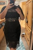 Dress fit like a glove, but unfortunately had 2 tears, one in the front and one by the back zipper. I am hoping the next one arrives with no tears. Not much stretch so had to size up after ordering a medium. - Linda S.