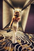 I wore this for NYE and got so many compliments!!! I wore 6" platform heels and avoided having to get it tailored. The bottom swept the floor perfectly! LOVE!! - Jessica H.