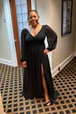 I wore this dress as a bridesmaid in my best friend's wedding. This was a last resort when the other 2 dresses ordered on other sites didn't fit properly. I ordered a medium and large and the medium fit better in my chest area and lengthwise, but would not zip all the way. When I put on the large, the shoulders were WAYY too long, my boobs just sat there and the waist actually felt tighter than the medium. The large had a ton of cleavage and I had to pull the dress slightly off my shoulders and tape the neckline back, so it'd show less cleavage. Note: I didn't wear a bra because it's backless. I wish there had been a size in between the medium and large that would've been perfect. Since I got this dress 2 weeks before the wedding, there was no time for alterations. I used dress tape but even still I did not like how the chest area of the dress looked. The dress did serve its purpose and I got lots of compliments. I'd suggest you buy it in time to get alterations, if necessary! - Alysia F.
