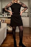 I REALLY wanted to like this dress. I thought it fit really well (I sized up to a Large just to be safe with how tight it appeared in the photos) but unfortunately, the seam on the left sleeve was ripped about 3 inches when I received it. I didn't have enough time to order a new one, so I sewed it the best I could. But then just a couple hours into the night, I noticed it completely coming apart all over. Again--this dress was not extremely tight and definitely looser in some spots, so I don't think it was ripping from it being too tight. I absolutely love this style, though - Colleen B.