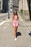 Such a cute set, but the top was very loose on me (even after tightening the straps as much as they can and tying the back as tight as possible). I usually wear an XS in tops, but I think an XXS would have been best if they offered it in this top. - Jillian Z.
