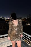 I bought this to wear on NYE in Nashville and it was perfect. The sequins are sewn on so well and don't get caught on each other which I found with other dresses from other stores. Length was perfect. The top of the dress was a little big on me but was fine. Shoulder pads gave it shape. So many strangers complimented! Great buy - Angela L.