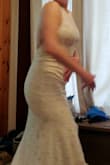 This is such a fun dress! The length is so dramatic and will photograph well. It was a little tight at the waist, but sizing up I would not have fit well in the top. - Christine H.
