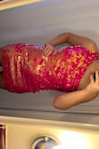 This dress is very pretty and fit me great, just not quite my style so I sent it back. Excellent quality and the color pops! - Macey E.