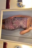This dress fit perfectly (size L) and has a very cool design. Not quite my style so I sent it back but excellent quality. - Macey E.