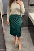 I am obsessed with this dress. Ive worn it so many times to weddings, and even to work with a sweater over the top of it. A little but loose but still my normal size (L) - Macey E.