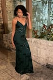 Loved this dress. Color was beautiful and the dress itself was fit to my body. Very flattering shape. Would say it's a little big around my bust but that's always the regular , was able to tighten with straps. Has a beautiful tail and matched with gold jewelry . Wore to evening NYE wedding as a guest. - Michelle A.