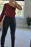 I got this in a different color in small and it was a little baggy, then I ordered an XS and it will still baggy. I said before that the concept is really cute but with it being a bodysuit I expected it to be more form-fitting, it wasn't very flattering. - Karan S.