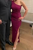 I'm glad I ordered an XS. If you are in between sizes, size down. The Magenta color is beautiful. Style is classy and sexy.  Received lots of compliments. - Emma M.