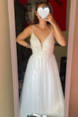 I was so impressed with the quality of this dress. The detail is so beautiful! I would recommend to anyone!! The skirt of the dress has a little sparkle, but I think it adds a nice touch. - Lianne M.