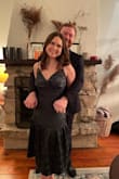 This dress is so flattering and perfect for any fall/winter/spring occasion. I am on the shorter size and the midi length worked great for me and with heels. Given my weight and height, Lulus recommended a medium but with my other dresses, I always wear a small. I ordered a small instead and am so glad I did! I think I would have been swallowed in the medium. I had the straps pulled tight so my boobs were completely covered and I did wear a strapless bra. I do think this dress would fit people with a larger bust, and you should size down if you are not that. Overall, it's a cute dress with lovely detail and I would recommend!! - Carson C.