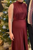 The color and fit of this dress were perfect. The elastic waist was comfortable and the right size. However, I could not get the wrinkles out of the dress. I washed it, steamed it, iron it. Still wrinkled, especially the top. - Emily W.