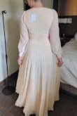 Ordered as a potential reception dress for my wedding. The medium was too narrow in the shoulders and too tight in the waist. I returned it for a size L. The first photo is size M. Second is size L. - Brittany D.