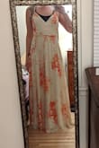 This dress is gorgeous and so majestic. The quality is top notch. I love it and can't wait to wear it out. - Brittany D.
