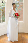 I purchased this dress in an XL for my wedding. The dress fit perfect in the bottom, but I did need alteration to the top, but that is typical for me. Absolutely no complaints about the this dress. If I hadn't worn it at my wedding I'd likely but several more in different colors. - Latanya T.