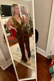 I love this dress! I feel like the price is well worth the quality. The only thing I'm concerned about is the cut being so low, I may add a snap at the bottom of the cut - Audrey F.