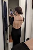 I wore this dress for a NYE Masquerade Party. I received tons of compliments!! The overall fit was great. I did have to wear pasties and boob tape for a little lift. The metal V kept the dress close to my chest. The hanger helpers did come out at times and just had to be re-tucked. Pictures from end of the evening. - Meghan S.