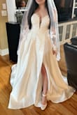 It's so perfect. It's actually really good quality and not too heavy like other wedding dresses this size. I will say I am normally a size 4 and I bought a size 8 and the 8 fits perfectly so definitely size up you can always alter it to be smaller. I'm on the shorter side so everything is long on me but once I put heels on it makes the length perfect. - Samantha G.
