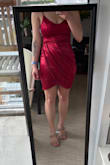 I decided to return it because it didn't have the sophisticated look I wanted. Vibrant red color, material as excepted. The top fits my chest but droopy. - Rachel K.