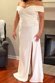 This dress truly was elegant and sexy. Great fit overall and lovely fabric with great stretch. My issue was personal : showed too much of the girls! It wasnt just cleavage.  Loved the fit but did return as I am looking for a little more coverage up top. Great dress other than my revealing problem. - Elizabeth C.