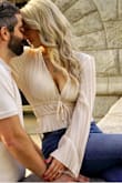 It is a gorgeous top, the color is to die for. It is shorter than I expected but it worked perfectly for my engagement photos! - Kait H.