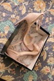 Love these heels. I saw other reviews about the size, so ordered down a half size than what I normally wear and they fit perfectly. - Molly C.