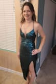 This dress is so stunning and I received lots of compliments on NYE! It is very figure flattering but has some stretch to where you're able to move comfortably. I like how the chest area stayed in place while dancing all night and with plenty of coverage. The slight comes up high, but not too high, but didn't fail me once when dancing. I definitely want to wear this again! So happy with my purchase. - Heather F.