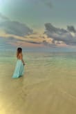 This is a beautiful dress especially for pictures. Took with me to Hawaii on vacation for pictures. - Caitlyn C.