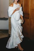 I loved this stole and received so many compliments when I wore it for my wedding rehearsal dinner. It's very soft and looks more expensive than it is. My only complaint was that the hook closure kept opening up, but otherwise, it was perfect. - Laura G.