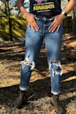 Glad I read the reviews. Was between a 7 and a 9 but due to others stating the jeans are stretchy and get loose after the first wash, I decided to size down. I wanted a more fitted but not skin-tight look since I have a baggy pair of high-waist jeans already. - AMANDA P.