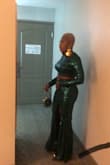 I loved this set. I changed the silver zipper on the top to a green one. I had the sides taken in a bit. It fits true to size. I wore tall platform heels do I wouldn't need the skirt altered. - Aricka A.