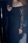 The quality of the dress surpases the price in my opinion!  I purchased the dress in black and it fits so perfectly and is actually quite comfortable.  I couldn't be happier! - Lea M.