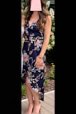 I was a little nervous about the high-low cut of the dress, was having some flashbacks of 2009. Once it was on, I loved it and the cut looked more flowy. I wore this to an August wedding and received a lot of compliments, especially about the neck line. The dress is a little tight around the torso when sitting, but not a big deal. - Martha S.