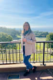 I love this jacket! It goes great with anything. I wear it with jeans and leggings and even my scrubs to work. It does run a little big. I am usually a medium and ordered a small and it is still baggy but I think that is part of the style. - Eryn G.