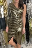 I ordered in a medium based on recommendation but ended up order a large instead. The medium fit but the slit came up way too high since it was a bit snug. The large fit perfect!

I wore this dress for New Years and got so many complements! - Amber H.