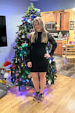 I absolutely loved this dress. The quality is amazing and I received so many compliments. The dress did not ride up for me. Can't wait to wear it again! - Katie-Leigh C.