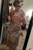 I ordered this skirt because I thought it would be great to dress up, like I styled it in the photo, or dressed down with a t-shirt and sneakers.
The skirt fits, slightly snug on my hips though. Great material, feels very expensive, and good quality! - Cat G.