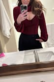 I bought it in both colors! It's so flattering and fits true to size. No bra needed, which is a plus! - Sarah T.