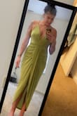 This dress is so comfy and super flattering. The top has no lining or padding, so I will need to use petals, but I love it so much I'm going to buy the other colors. It's a super slinky feeling, and just under the bust has a spandex piece that kind of sucks it in and gives you a perfect hourglass shape. I'm 5'7" and it is to my ankles in the back, so I think if you're shorter it may be a little long but. 10/10 would recommend. =B - Christina O.