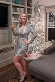 I LOVED this dress!! It fit perfectly and was so sparkly and amazing! I got so many compliments! The only problem is that after one wear with lots of dancing, the fabric started to pill up and get fuzzy from the sequins catching on themselves. I may only be able to get one more wear out of it, but it was worth it! - Andrea D.