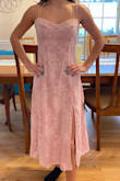 The fit was perfect along with the length. I was skeptical buying a size small for my daughter instead of a XS, but it fit perfectly. The detail was so stunning. - Christine L.